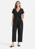 Wrap-Front Wide-Leg Linen Jumpsuit in Linen in Black — on model