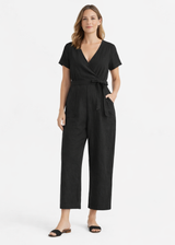 Wrap-Front Wide-Leg Linen Jumpsuit in Linen in Black — on model