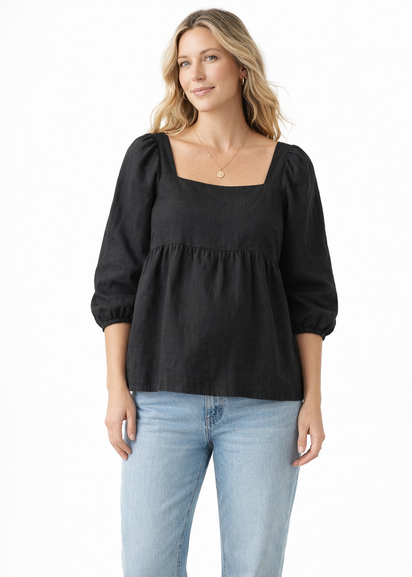 Puff-Sleeve Square-Neck Shirred-Back Floral Linen Blouse in Linen in Black — on model