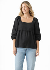 Puff-Sleeve Square-Neck Shirred-Back Floral Linen Blouse in Linen in Black — on model