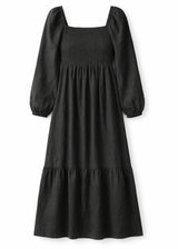 Long-Sleeve Smocked-Bodice Linen Midi Dress in Linen in Black — flat lay