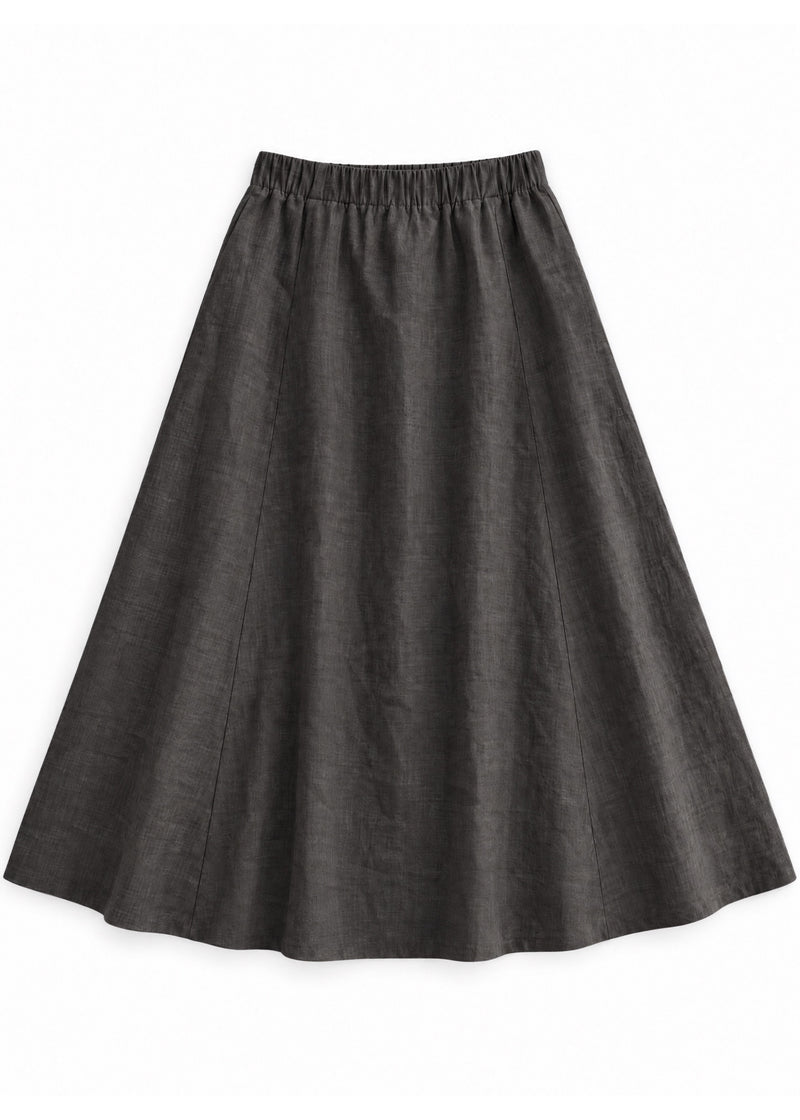 A-Line Paneled Skirt in ebony sandwashed linen, flat lay with gathered elastic waistband and vertical panel seams.
