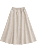 A-Line Paneled Skirt in natural sandwashed linen, flat lay with gathered elastic waistband and vertical panel seams.