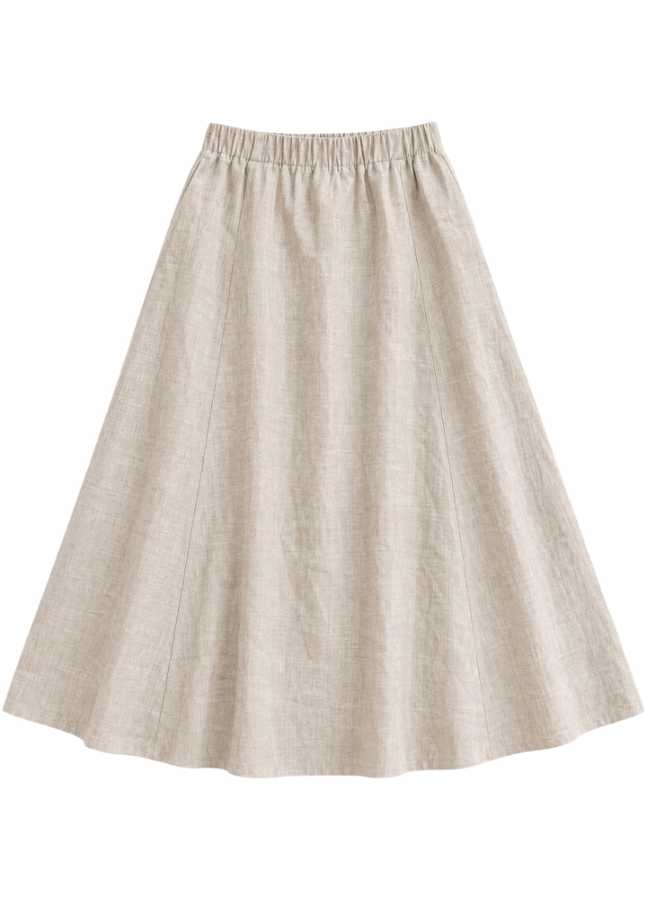 A-Line Paneled Skirt in natural sandwashed linen, flat lay with gathered elastic waistband and vertical panel seams.
