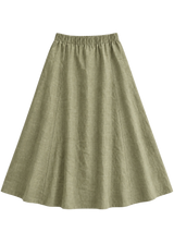A-Line Paneled Skirt in olive sandwashed linen, flat lay with gathered elastic waistband and vertical panel seams.