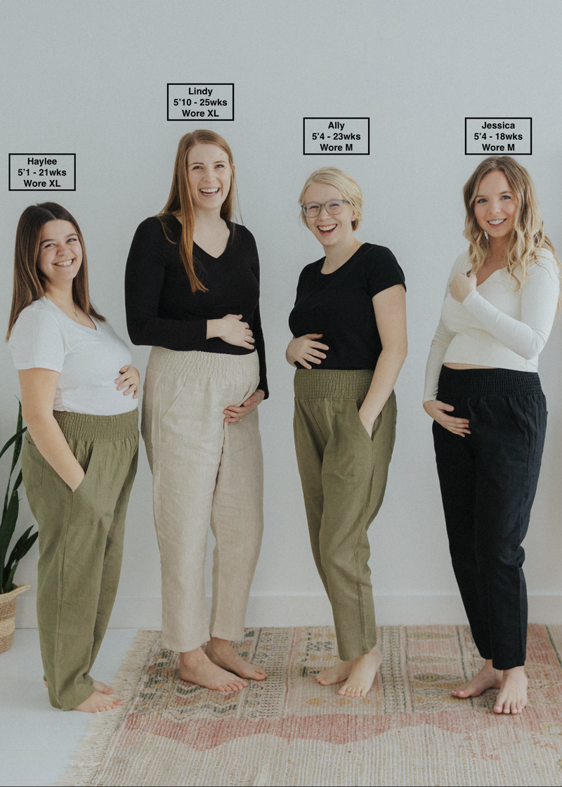 Four pregnant women model smocked linen pants in olive, natural, and black with functional pockets.
