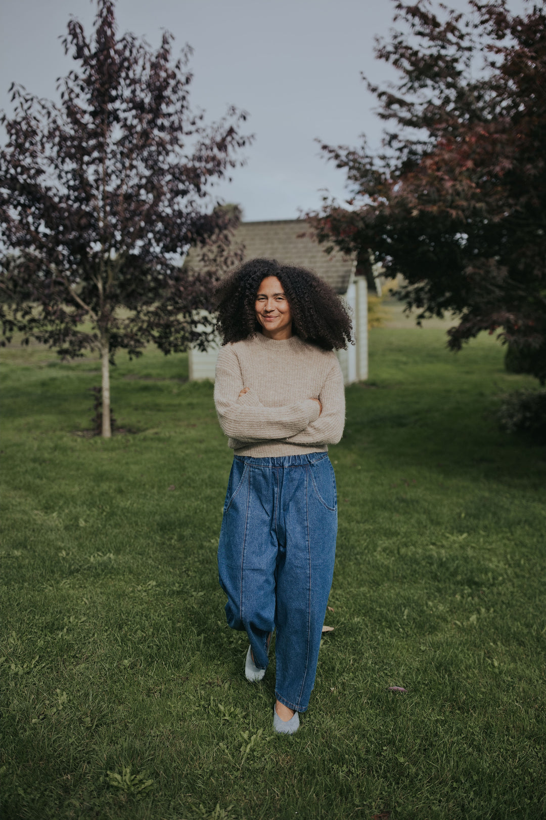Woman in the Indigo Balloon Jean Pant with a cropped oatmeal sweater, front view, full length