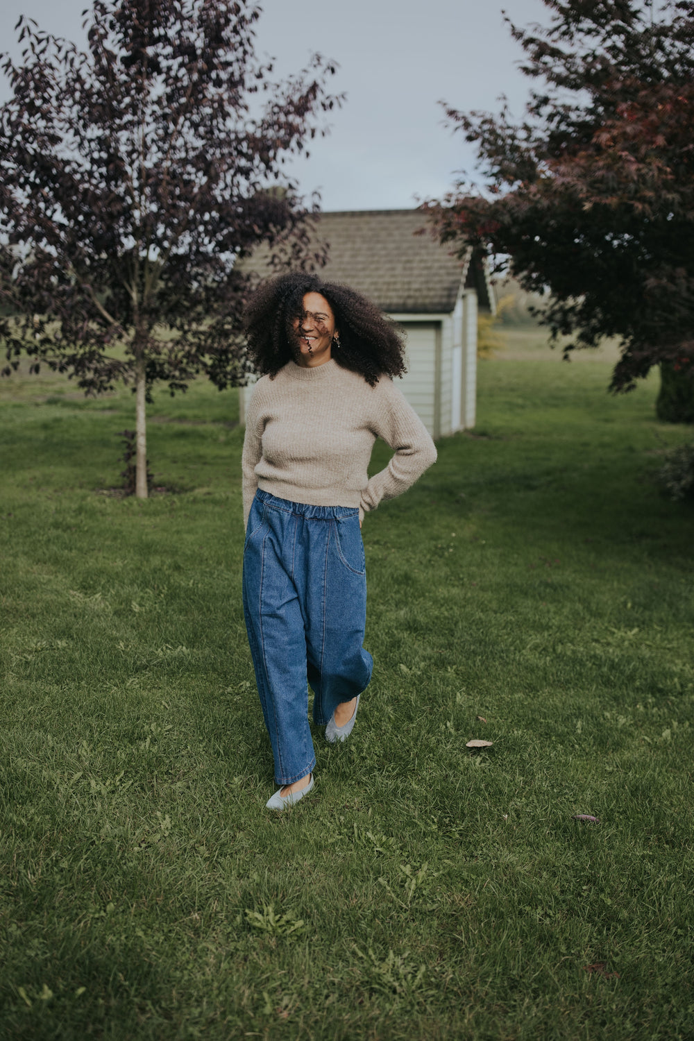 Woman in the Indigo Balloon Jean Pant, front view with hand on hip