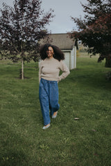 Woman in the Indigo Balloon Jean Pant, front view with hand on hip