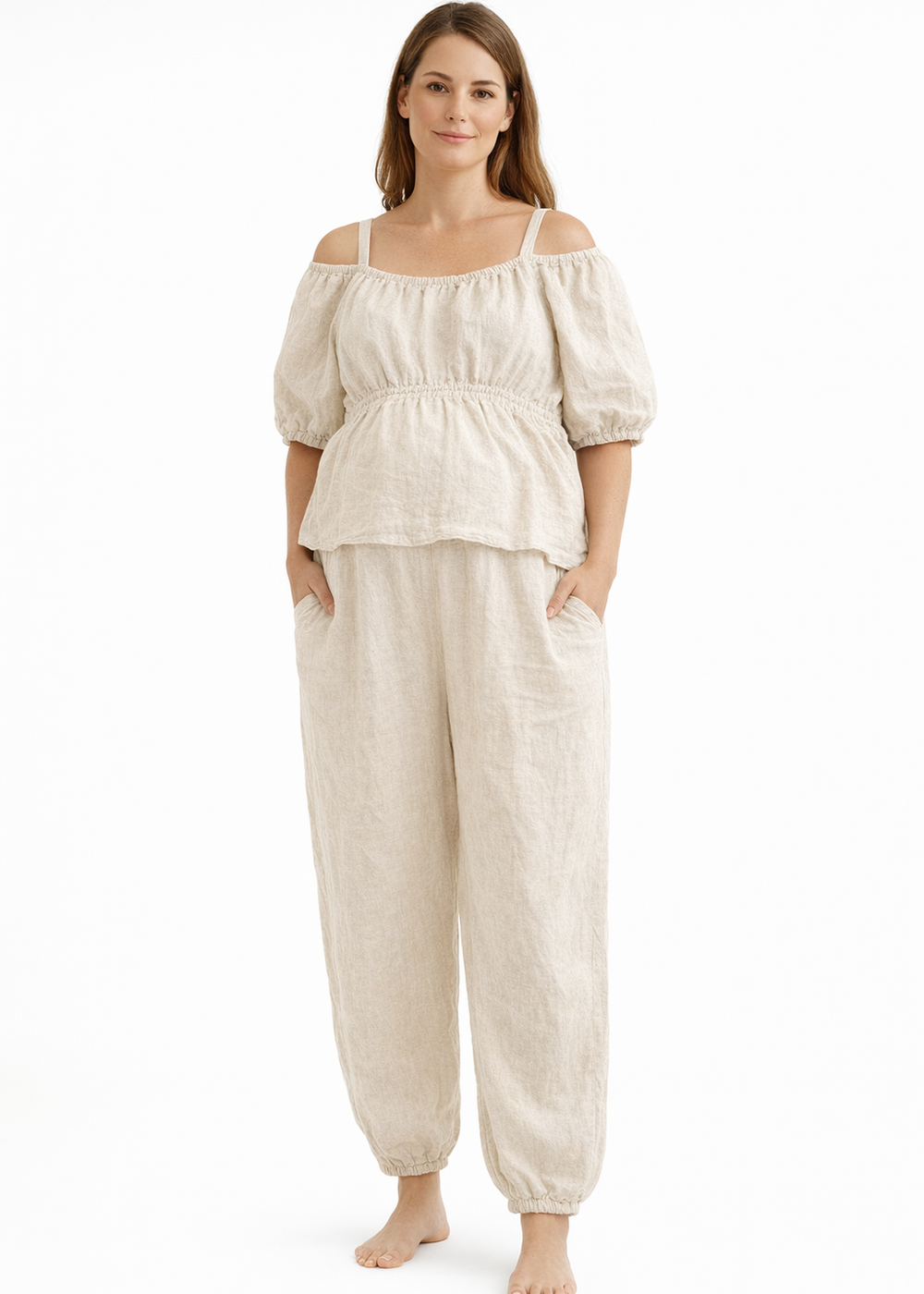 Off-Shoulder Peplum Jumpsuit in Linen in Natural — on model