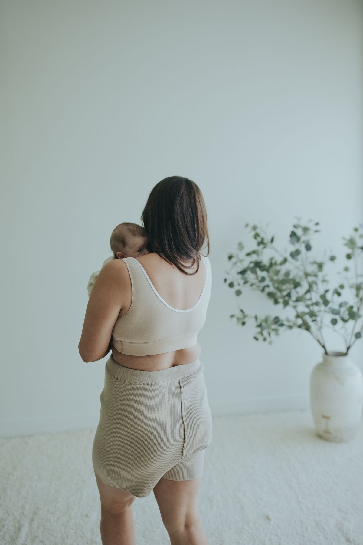 Back three-quarter view of the Sand Crossover Sleep Bra