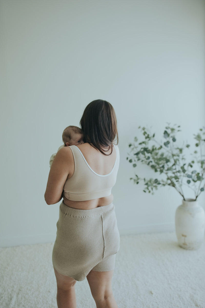 Back three-quarter view of the Sand Crossover Sleep Bra