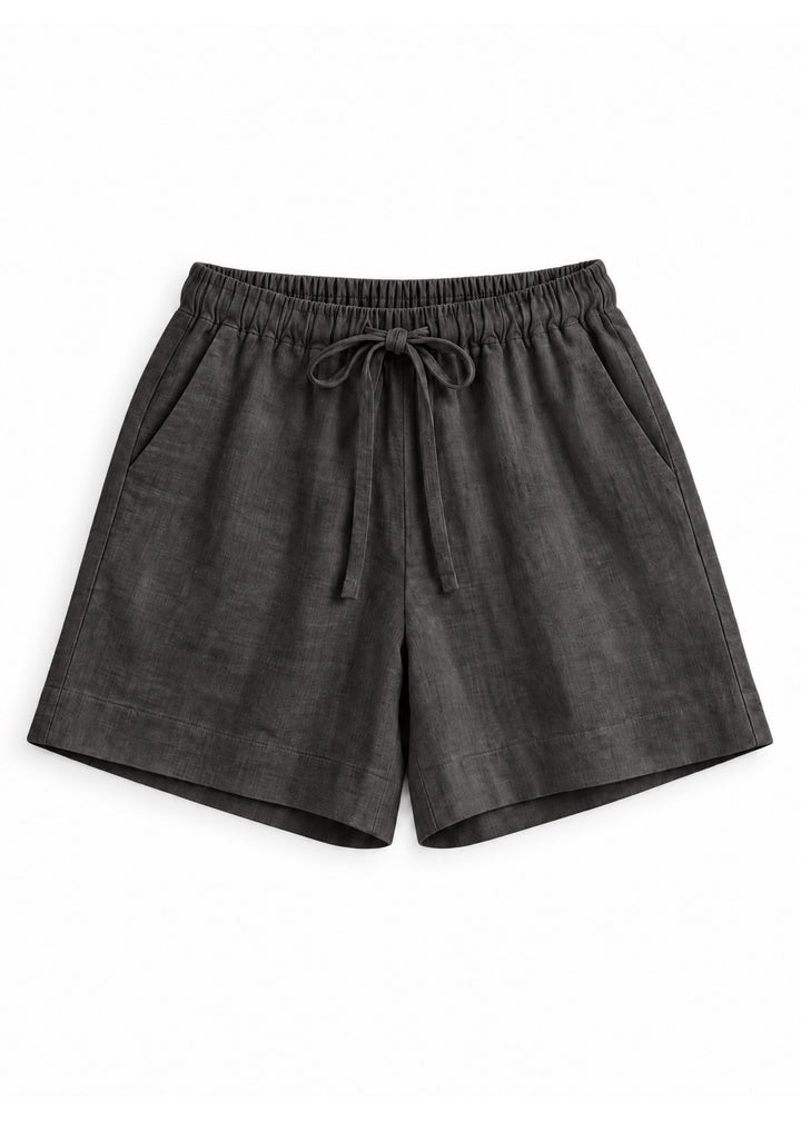 Drawstring Shorts in ebony sandwashed linen, flat lay.