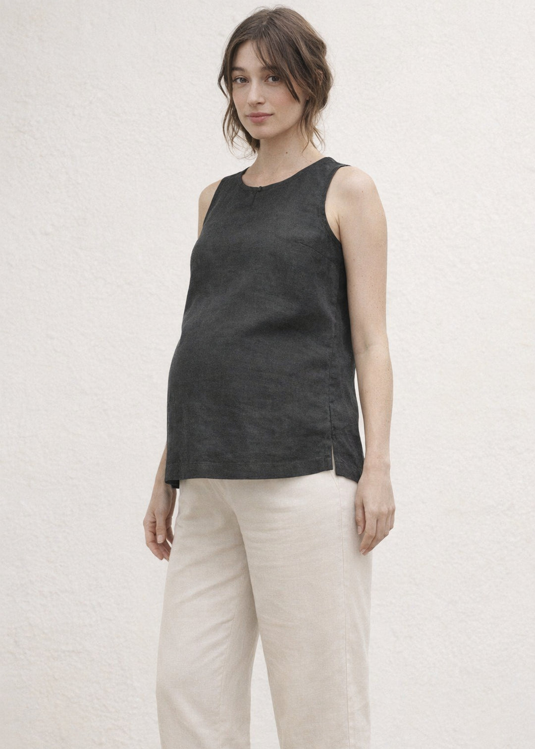 High-Neck Sleeveless Darted Linen Top in Linen in Black — on model