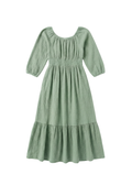 Seafoam green Eliza maternity and nursing maxi dress in cotton gauze with smocked waist, scoop neck, and balloon sleeves.