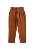 Everyday Breeze Pant in rust cotton gauze with a shirred elastic waistband and deep front pockets.