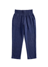 Navy blue cotton gauze Everyday Breeze Pant with elastic waistband and functional pockets.