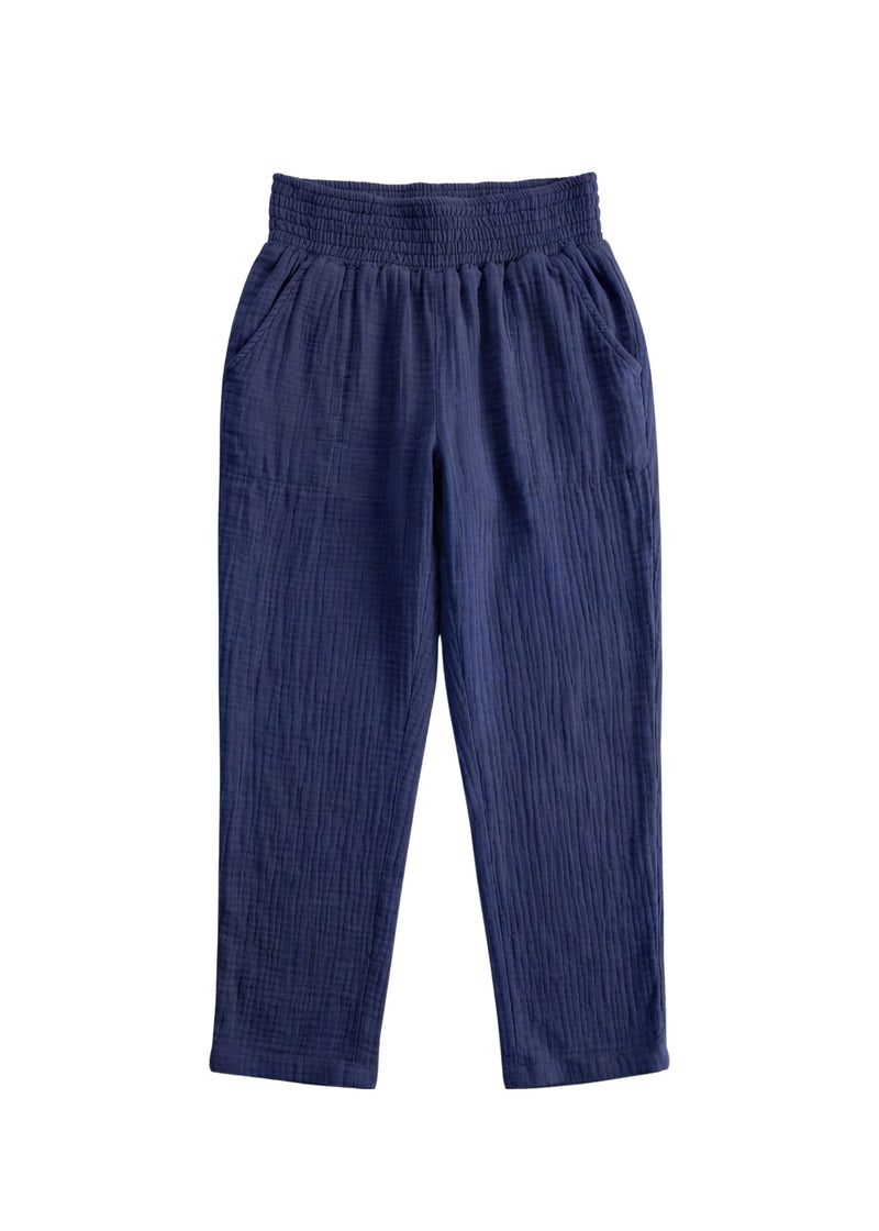 Navy blue cotton gauze Everyday Breeze Pant with elastic waistband and functional pockets.