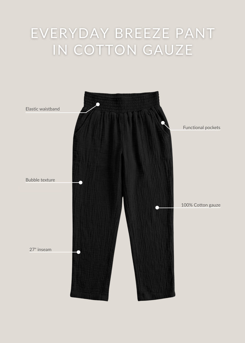 Black Everyday Breeze Pant in 100% cotton gauze, featuring an elastic waistband, bubble texture, and functional pockets.