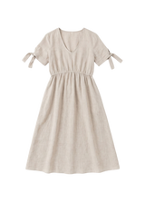 Flat lay of the Florence Midi Dress in natural sandwashed linen