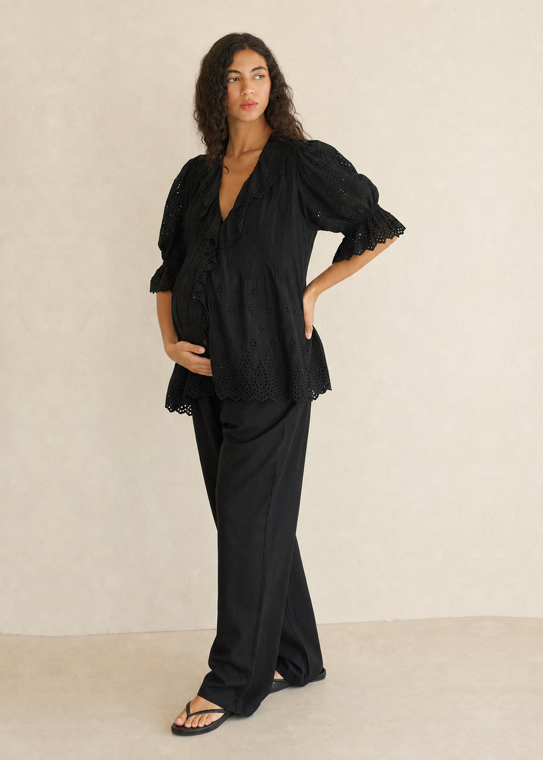 Eyelet Ruffle Puff Sleeve Blouse in Cotton in Black — on model