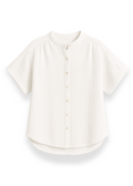 Oversized white cotton gauze button-down top with short sleeves and a mandarin collar.