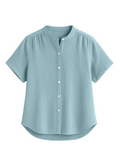 Light blue cotton gauze button-down top with short sleeves and a band collar.