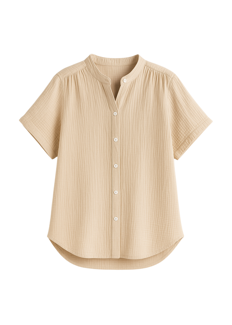 Oversized beige cotton gauze button-down top with short sleeves and a mandarin collar.