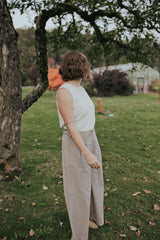 Side view of the Beige Haven Lift Top showing the sleeveless cut