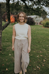 Woman in the Beige Haven Lift Top, front view, full length