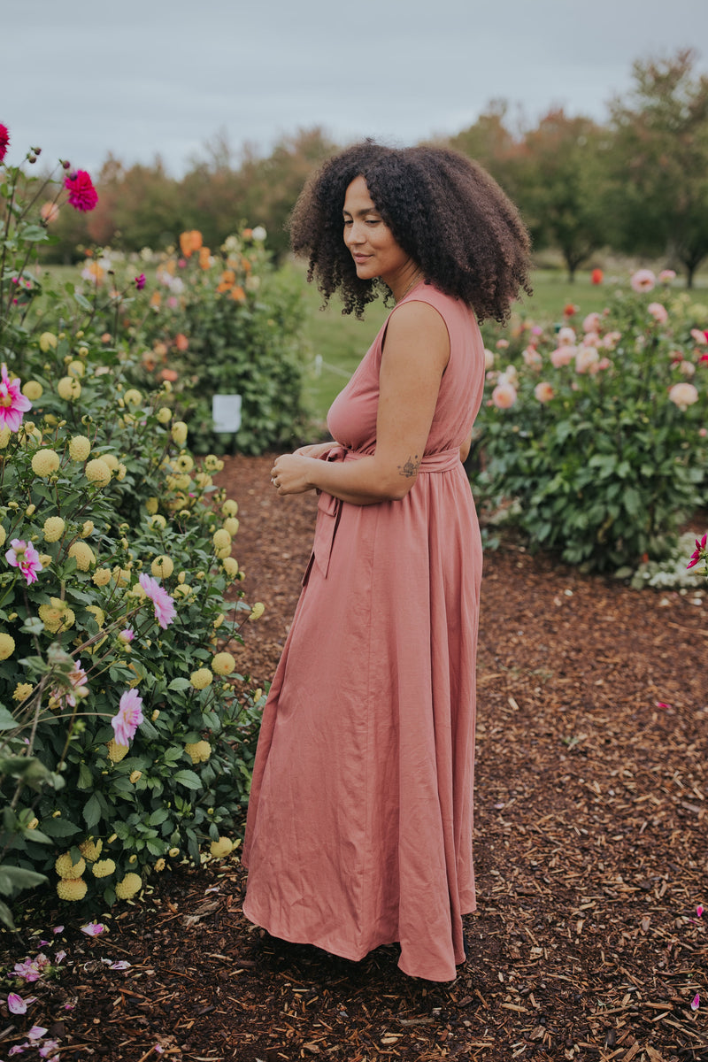 Side view of the Dusty Rose Iris Sleeveless Wrap Dress, maxi length