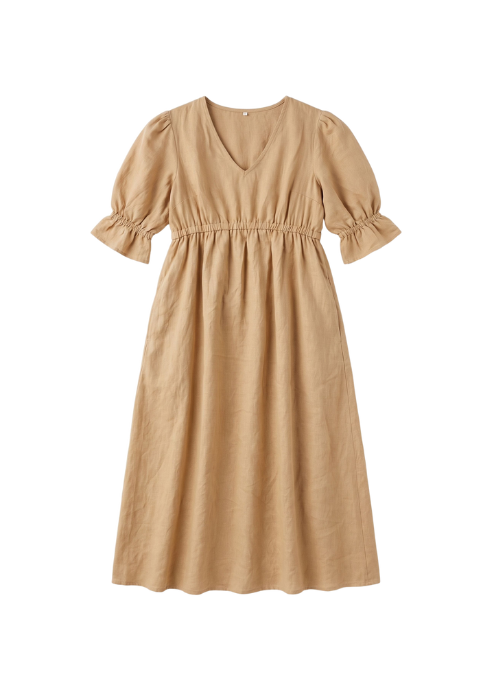 Flat lay of the Julia Dress in tan sandwashed linen