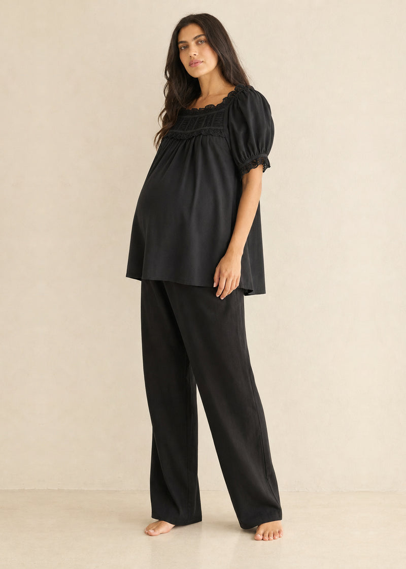 Lace Yoke Puff Sleeve Blouse in Cotton in Black — on model
