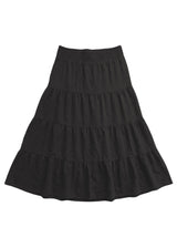 Black cotton/linen tiered midi skirt with an elastic waistband.