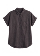 Nora Camp Shirt in ebony sandwashed linen, flat lay with point collar, chest pocket and cuffed short sleeves.