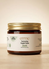 Emme Nurturing Nipple Balm, 2 oz amber glass jar with gold lid, white label.
