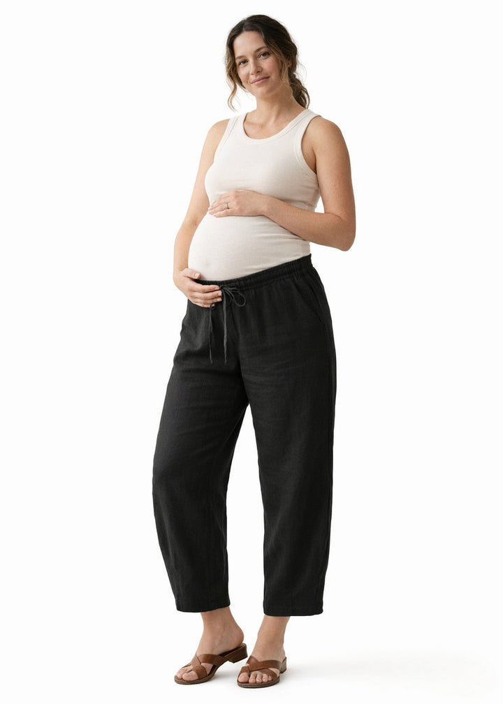 Barrel-Leg Under-Bump Drawstring Linen Pants in Linen in Black — on model
