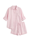 Oversized pink linen co-ord set with a button-up shirt and drawstring shorts.