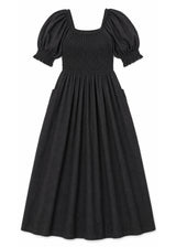 Puff Sleeve Smocked Bodice Midi Dress in Cotton in Black — flat lay