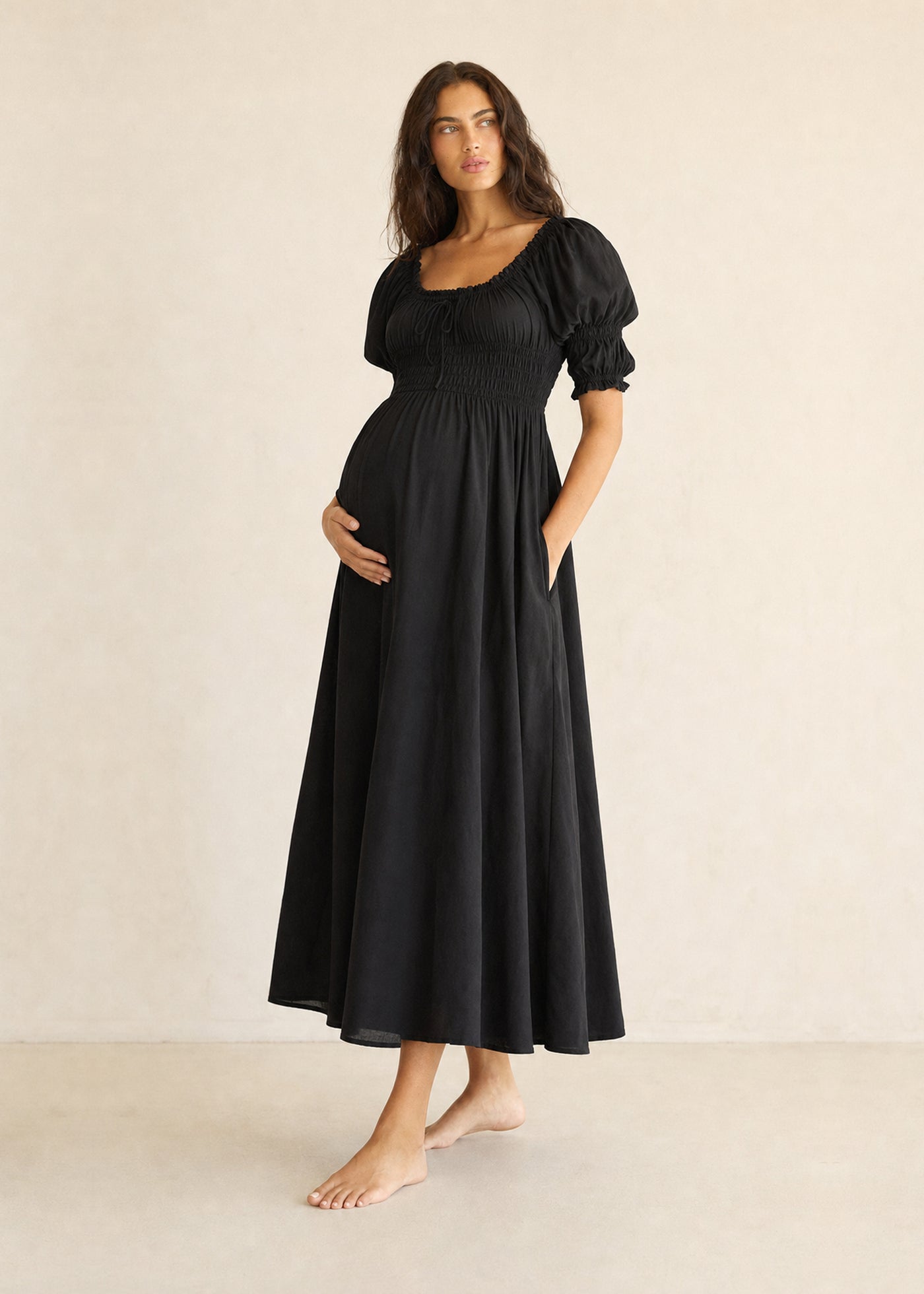 Puff Sleeve Smocked Bodice Midi Dress in Cotton in Black — on model