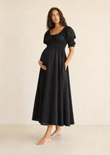 Puff Sleeve Smocked Bodice Midi Dress in Cotton in Black — on model