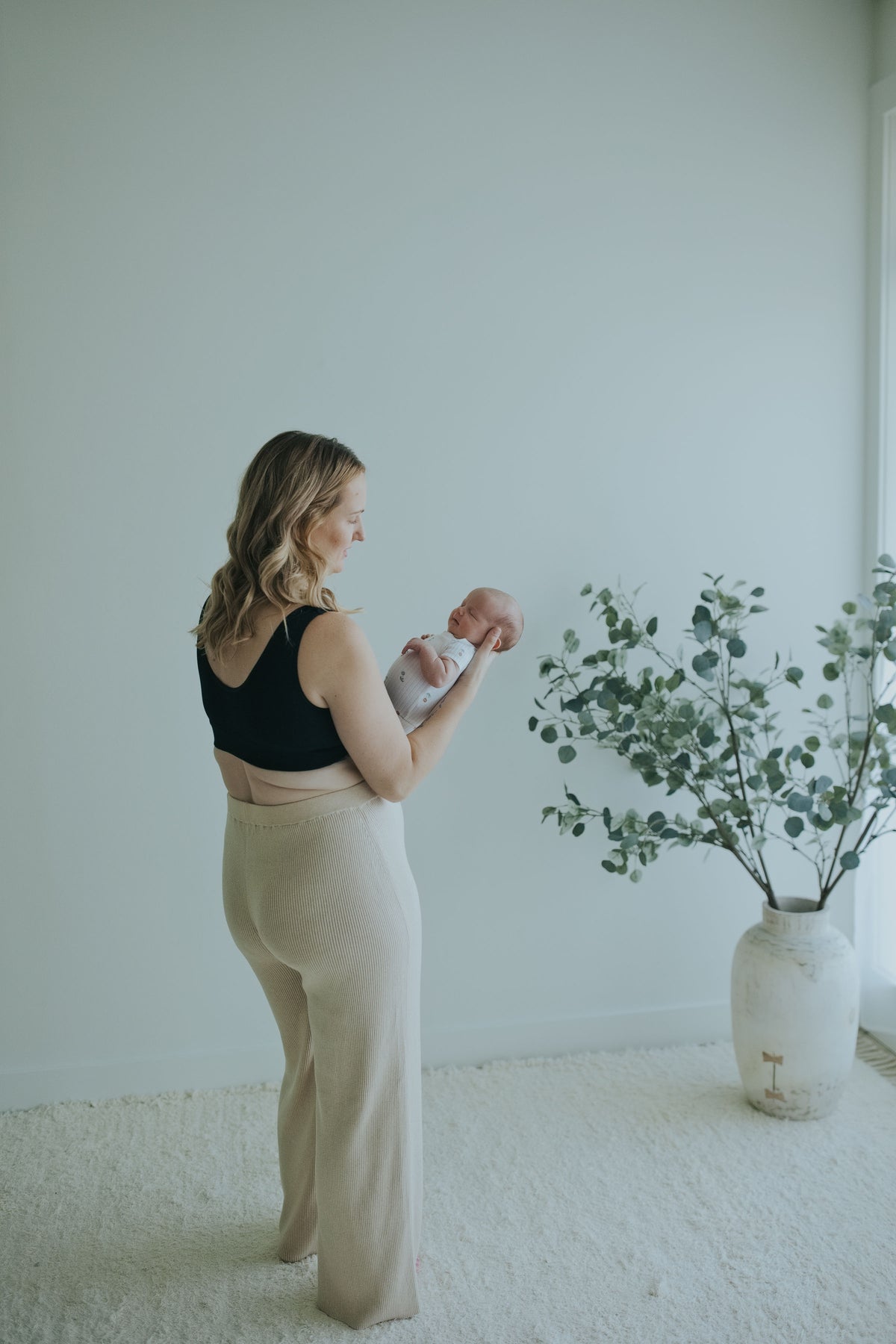 Side back view of the Oatmeal Ribbed Knit Wide-Leg Pants