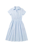 Light blue cotton poplin Sarah Shirt Dress with short sleeves, collar, button placket, and shirred elastic waist.