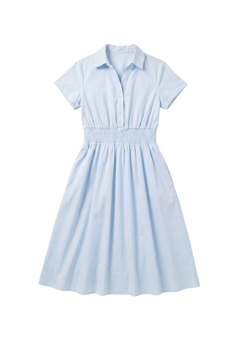 Light blue cotton poplin Sarah Shirt Dress with short sleeves, collar, button placket, and shirred elastic waist.