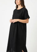 Pleated Button-Front Linen Midi Dress in Linen in Black — on model
