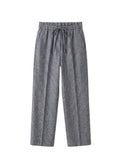 Gray tapered drawstring sweatpants with an adjustable waistband and functional pockets.