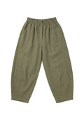 Olive green linen/cotton barrel pants with a stretchy waistband and deep functional pockets.