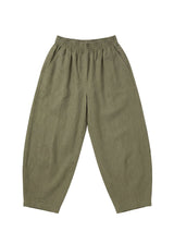 Olive green linen/cotton barrel pants with a stretchy waistband and deep functional pockets.