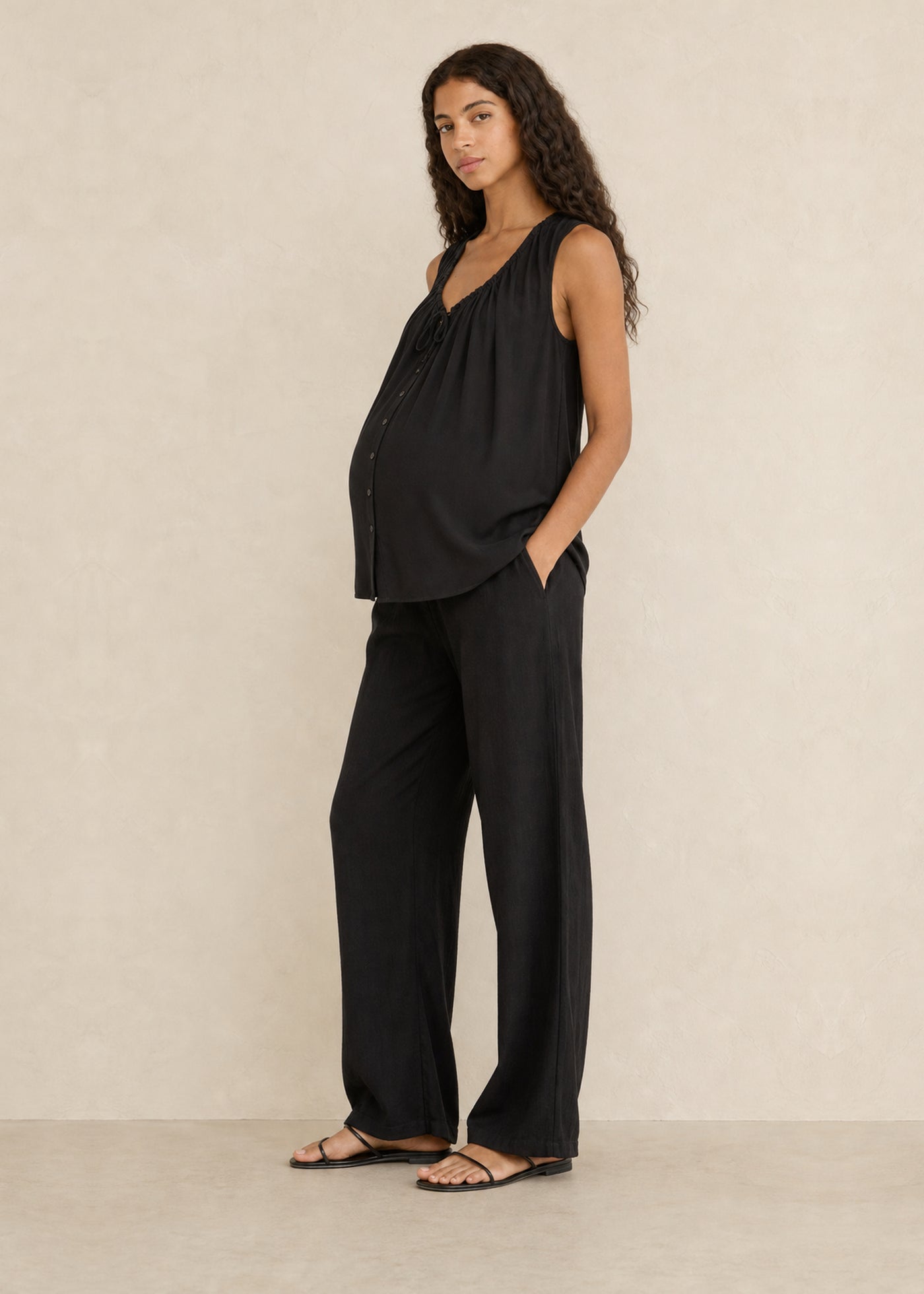 Tie-Front Sleeveless Top in Cotton in Black — on model