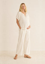 Puff Sleeve Button-Front Blouse in Cotton in Natural — on model